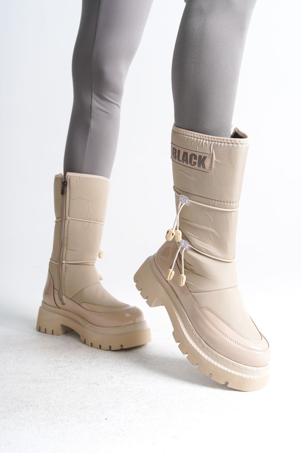 LUCY Lastikli Fermuarlı Paraşüt Kumaş Rugan Kadın Bot CKT - Krem LUCY Lastikli Fermuarlı Paraşüt Kumaş Rugan Kadın Bot CKT - Krem